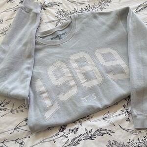 Taylor Swift worn light blue faded 1989 crewneck